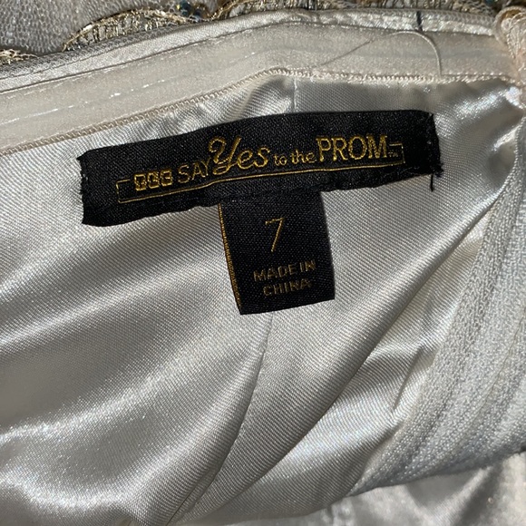 This is a white/off white and gold  TLC SAY YES TO THE PROM dress - Picture 3 of 5